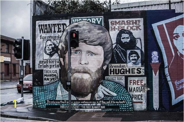 A symbol of Belfast mural in Belfast Northern Ireland depicting the region s past and present political and religious divisions