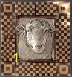 Handmade sheep tile with surrounding checkered tiles