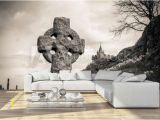 Castle Stone Wall Mural Old Stone Celtic Crosses A Graveyard with Daffodils and