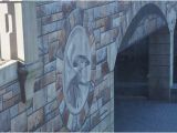 Mural Painting On Concrete Wall the “carvings” are but An Allusion Cleverly Painted so to